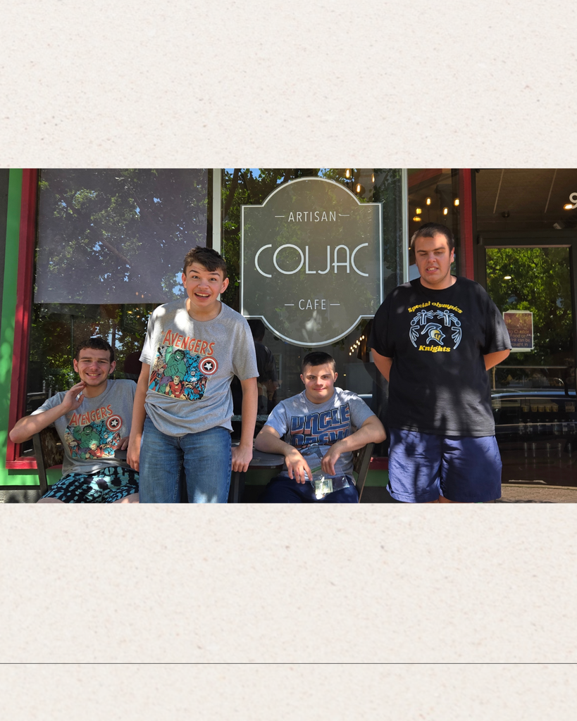 students standing in front of ColJac Artisan Cafe
