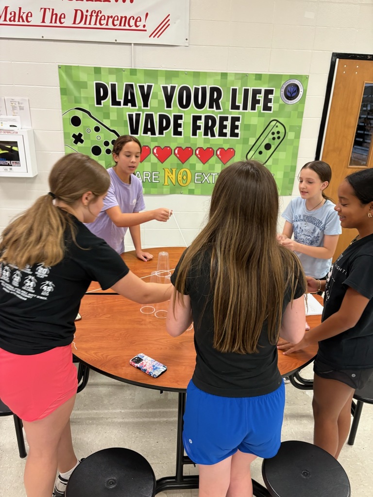 students doing a team challenge