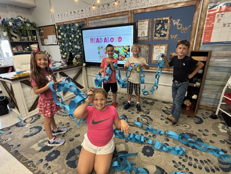 students building paper chain