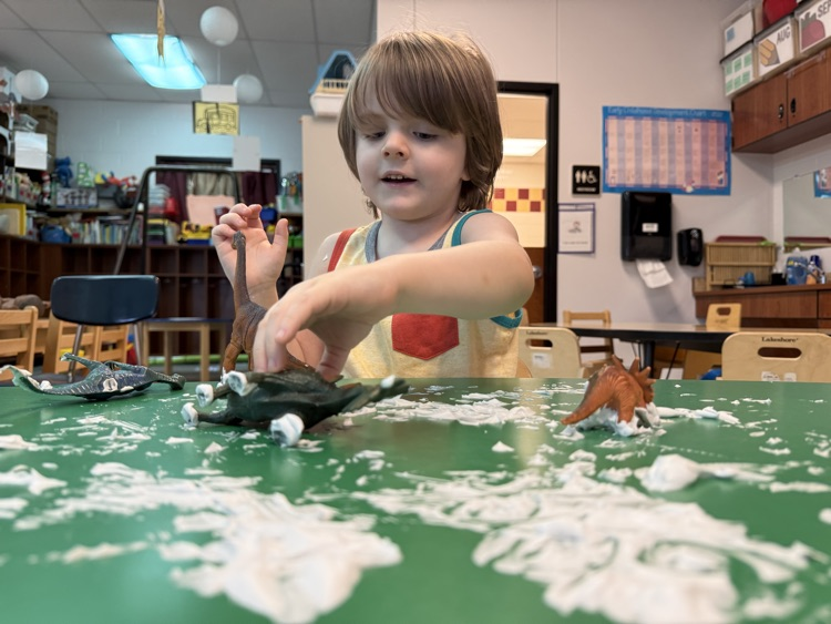 Prek students using gross and fine motor skills