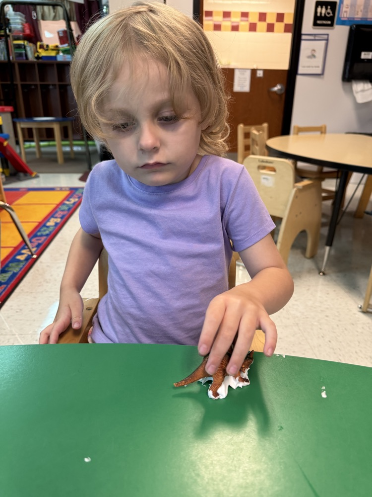 Prek students using gross and fine motor skills
