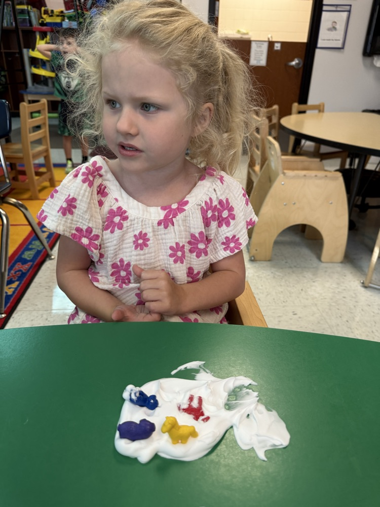 Prek students using gross and fine motor skills