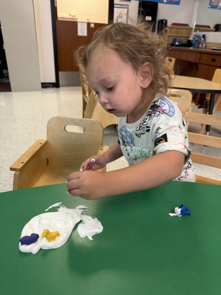 Prek students using gross and fine motor skills