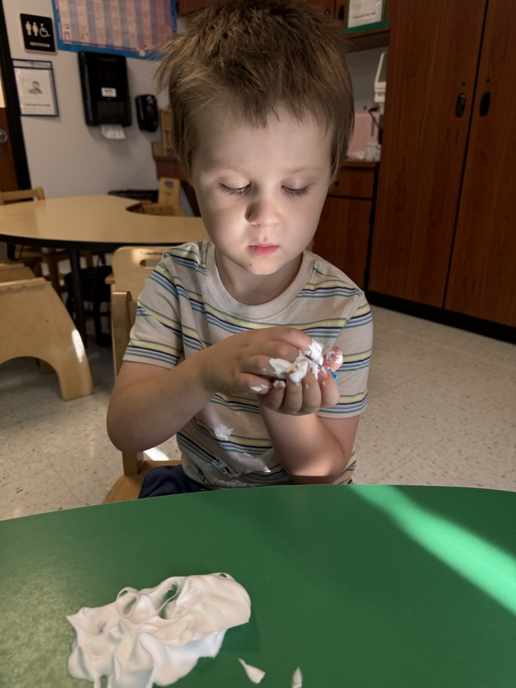 Prek students using gross and fine motor skills