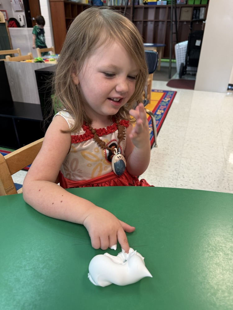 Prek students using gross and fine motor skills