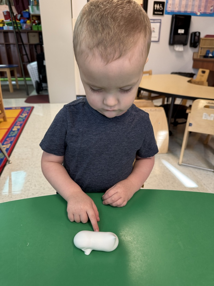 Prek students using gross and fine motor skills