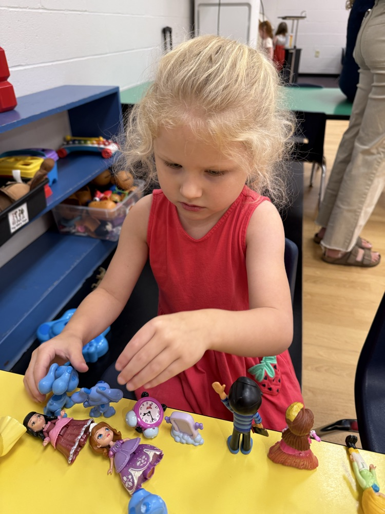 Prek students using gross and fine motor skills