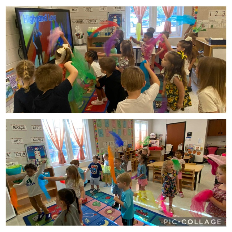Practicing new stations with new friends and music and movement- scarf dance