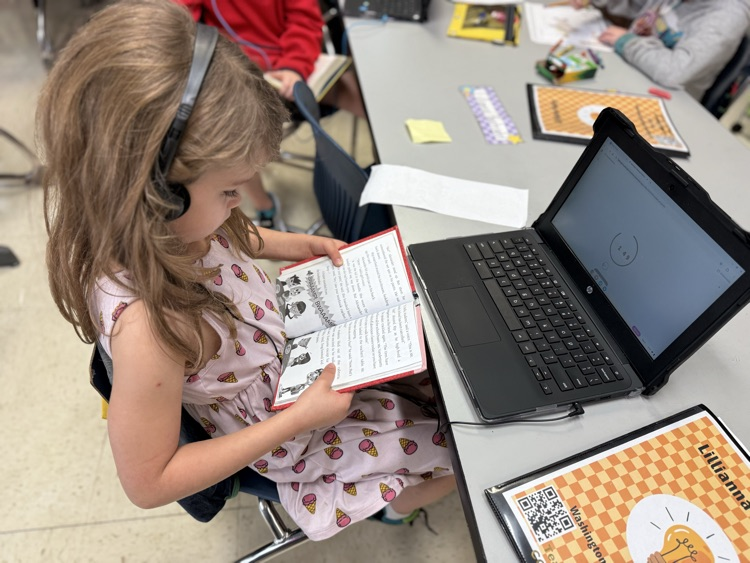 student reading independently 