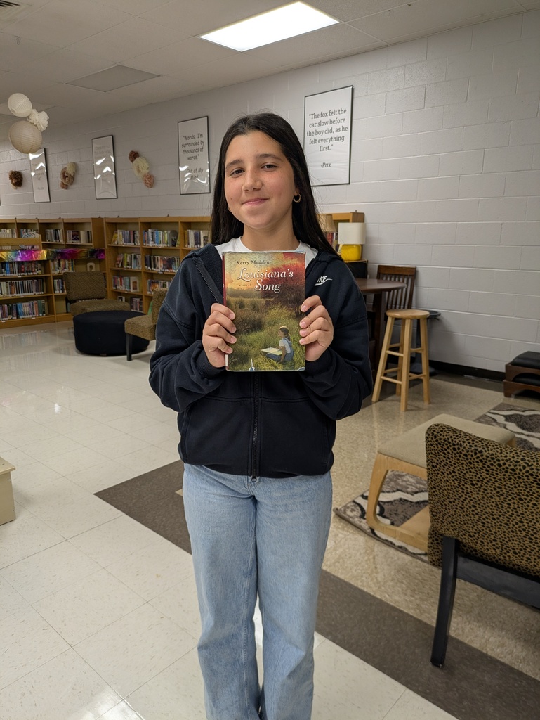 student with library book
