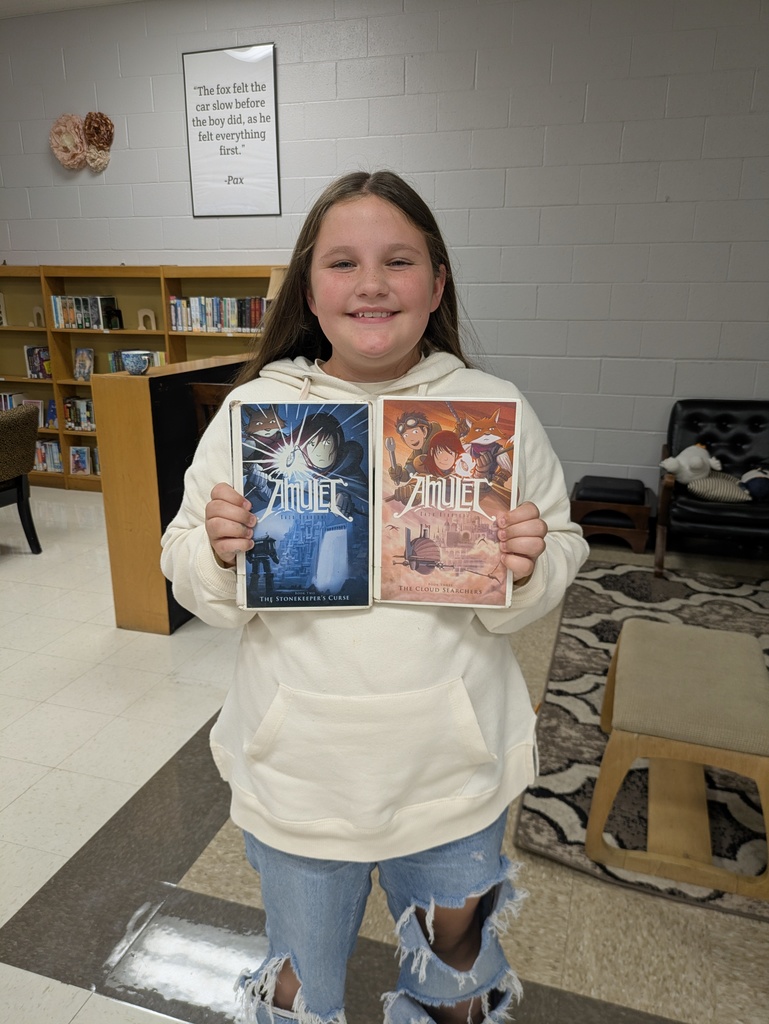 student with library book