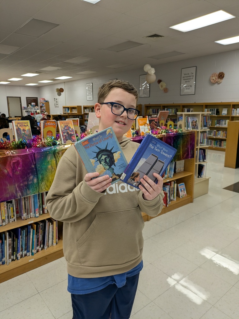 student with library book