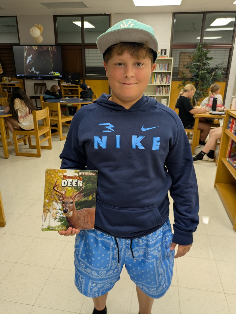 student with library book