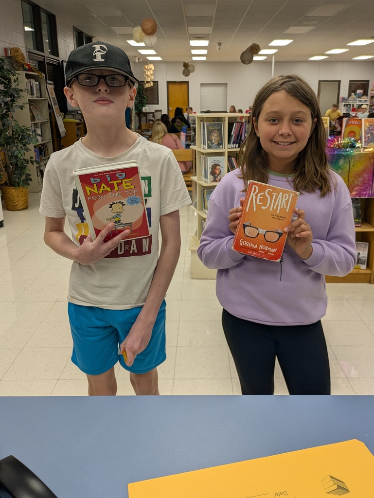 student with library book