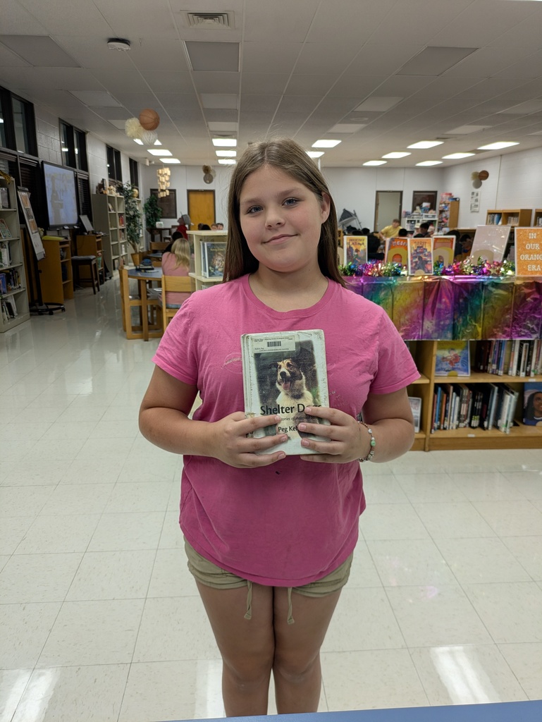 student with library book