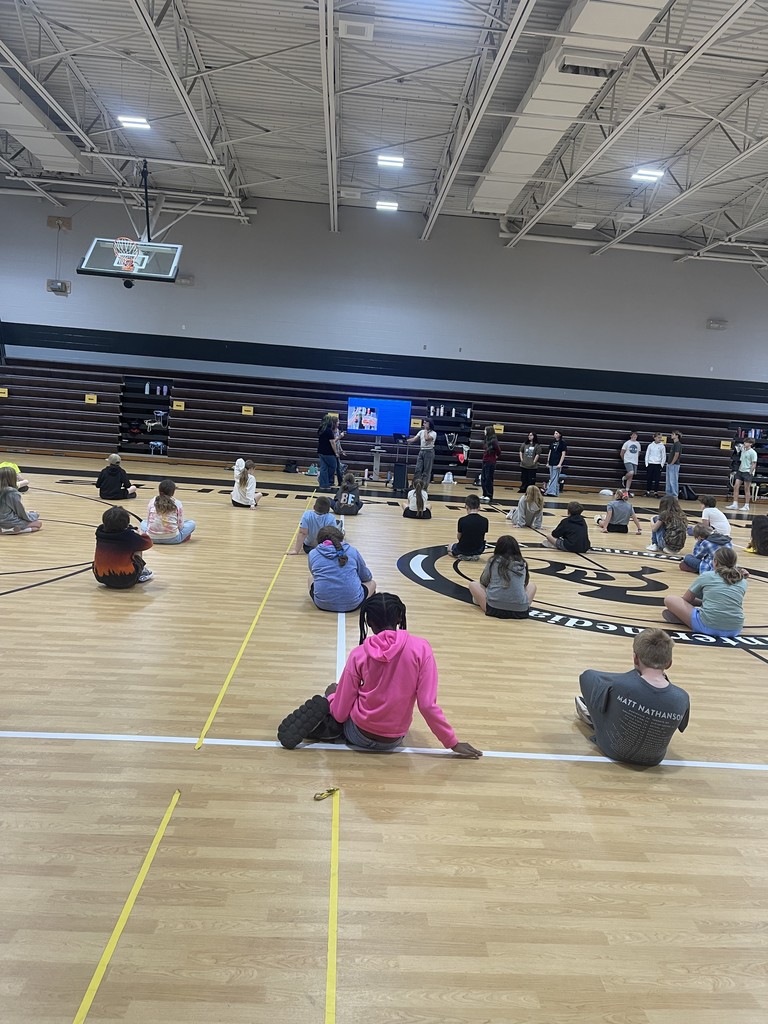 Students in a class presenting to Lincoln students