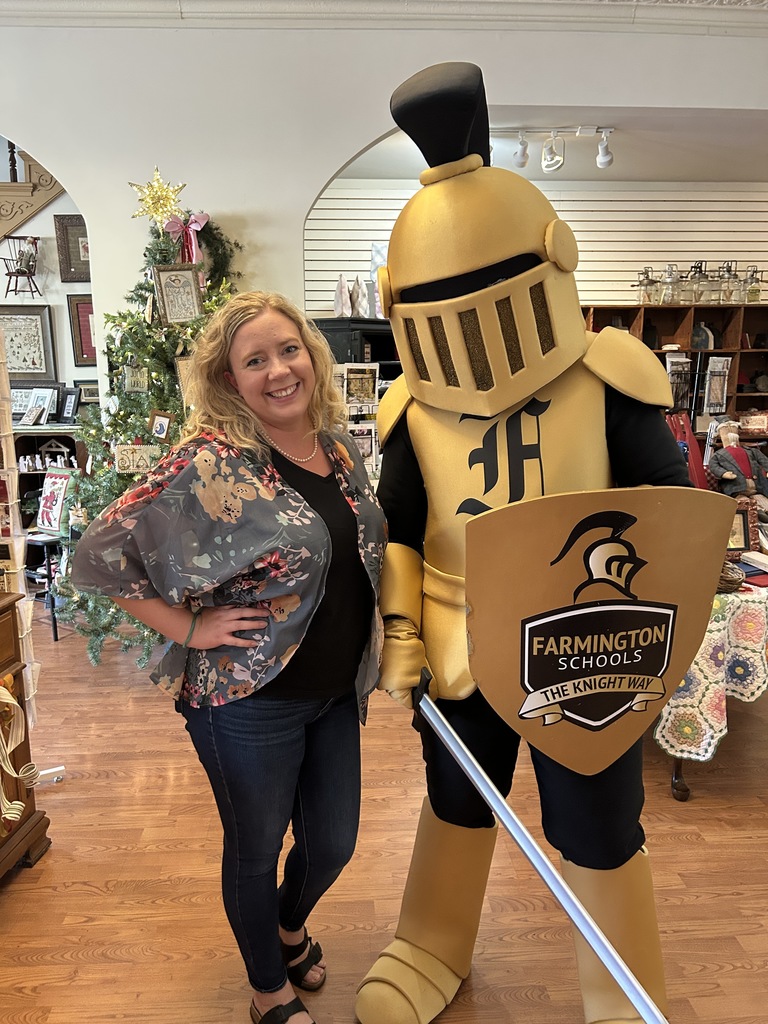 Knightro with shop owner