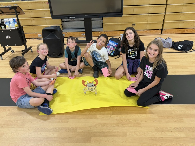 fourth graders presenting their science fair projects