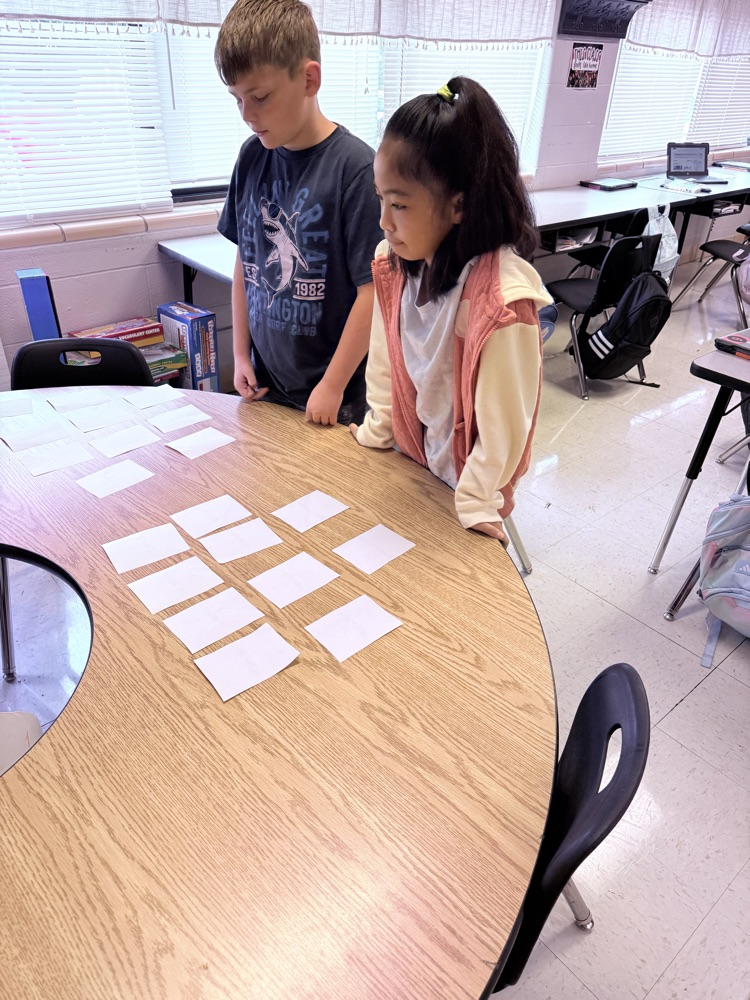 students playing matching vocabulary game
