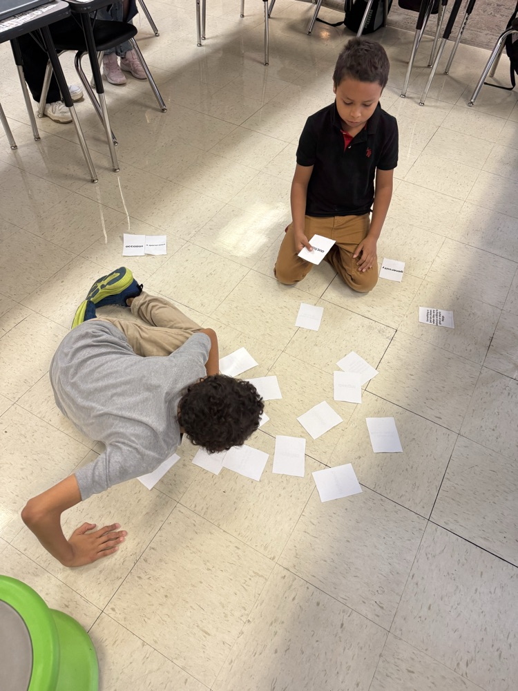 students playing matching vocabulary game