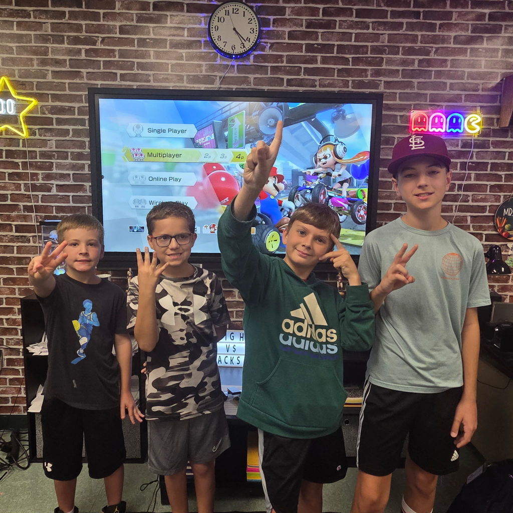 Students in an ESports club competing in a Mario Kart 8 tournament.