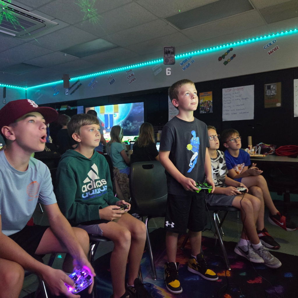 Students in an ESports club competing in a Mario Kart 8 tournament.
