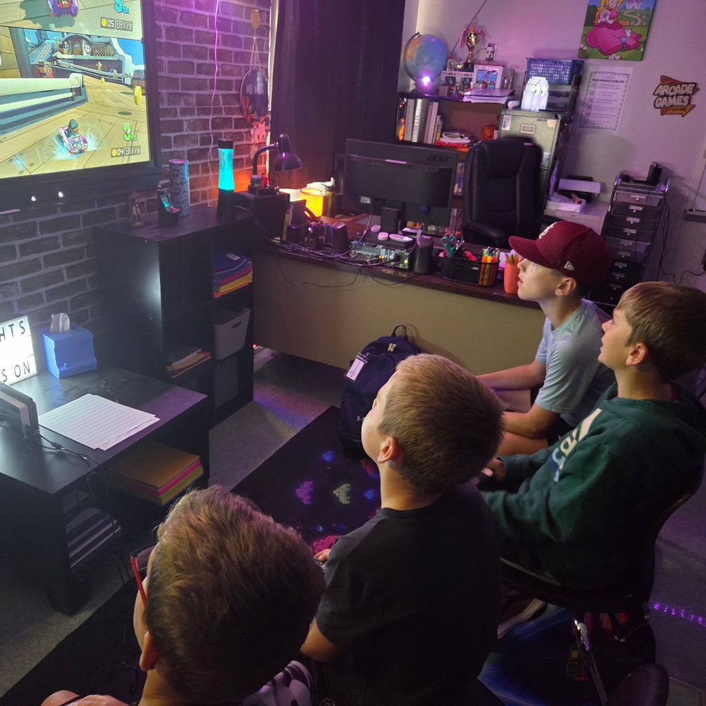 Students in an ESports club competing in a Mario Kart 8 tournament.