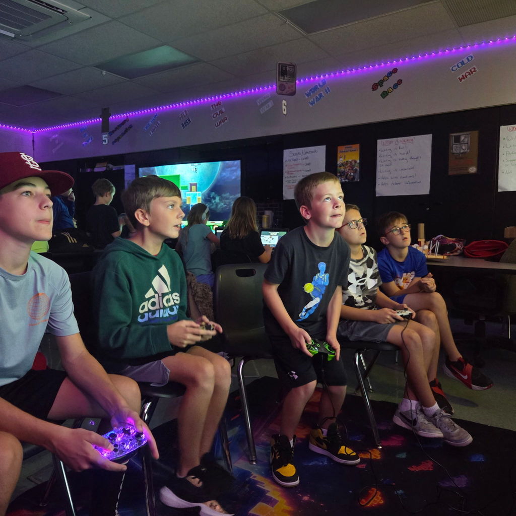 Students in an ESports club competing in a Mario Kart 8 tournament.