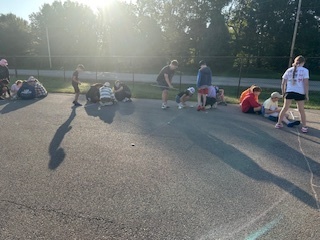 Students completing a solar lab outdoors.