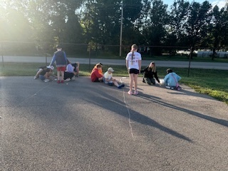 Students completing a solar lab outdoors.