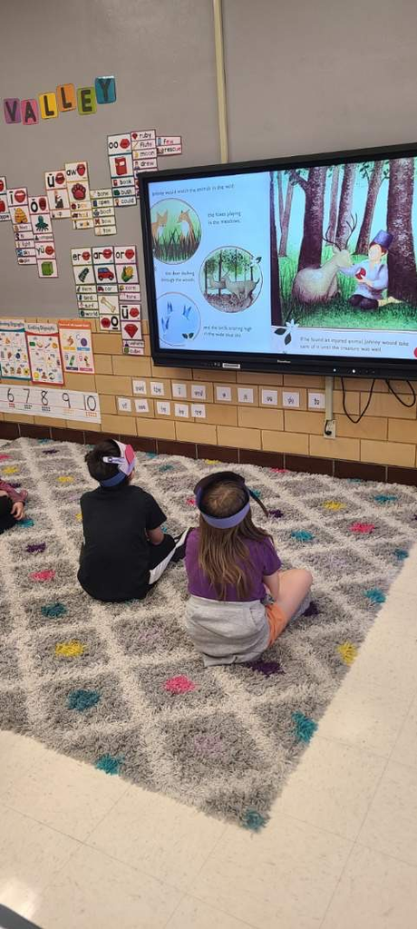 students enjoying an apple snack