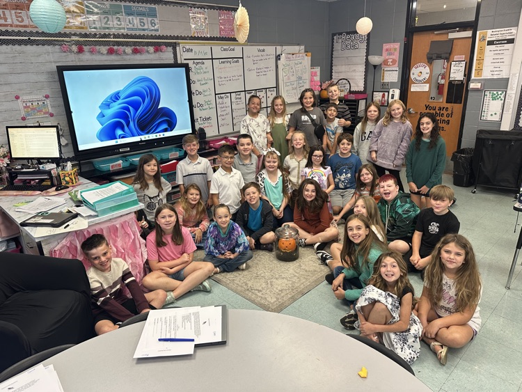 students with pumpkin