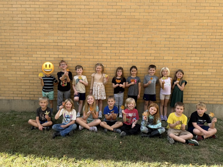 leaf hunt adventure with first grade students