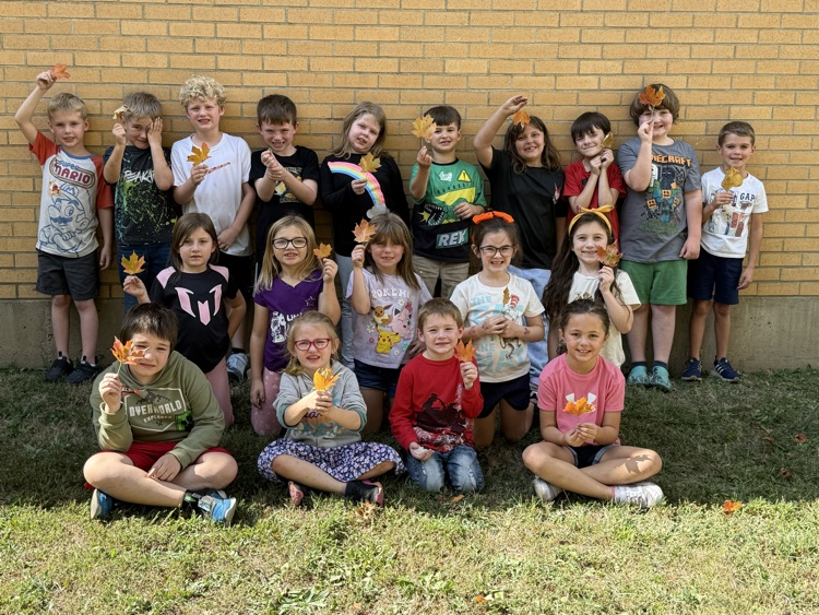 leaf hunt adventure with first grade students