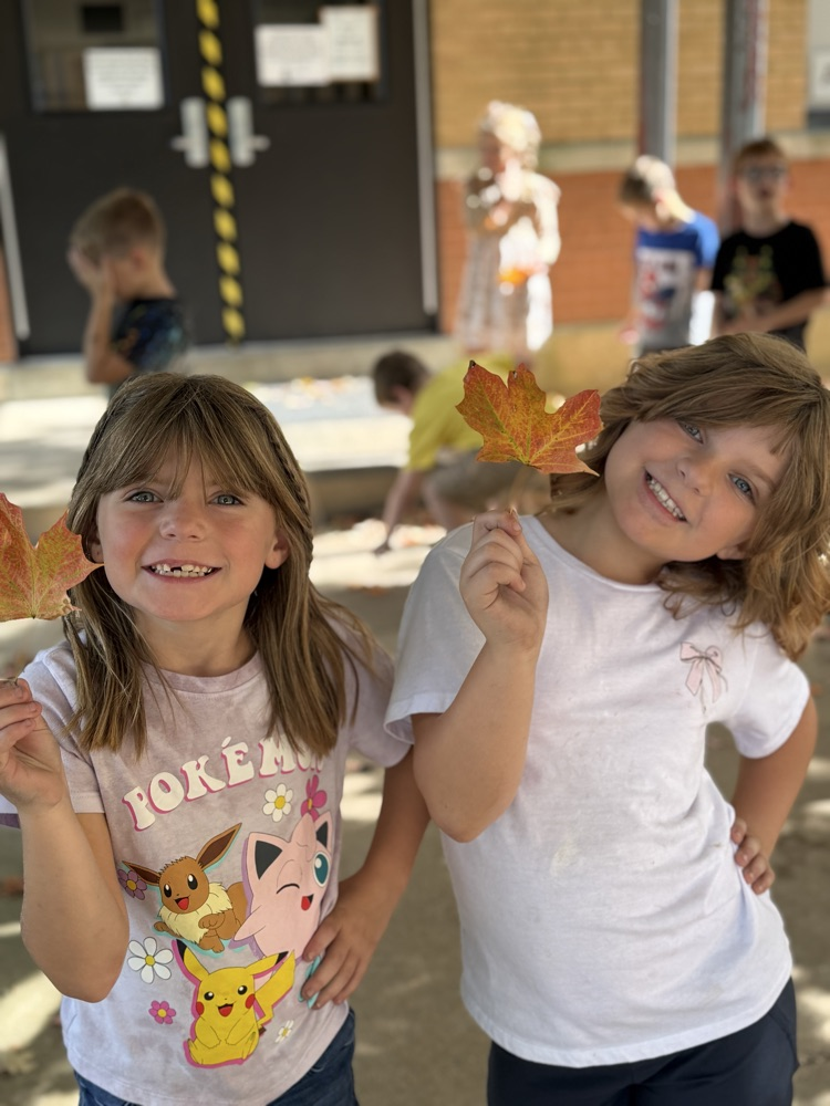 leaf hunt adventure with first grade students