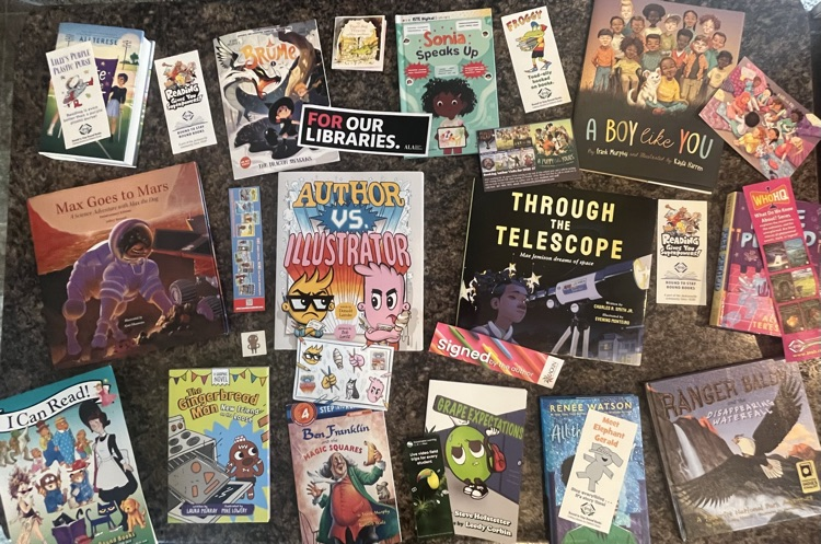 Free signed author books collected at AASL