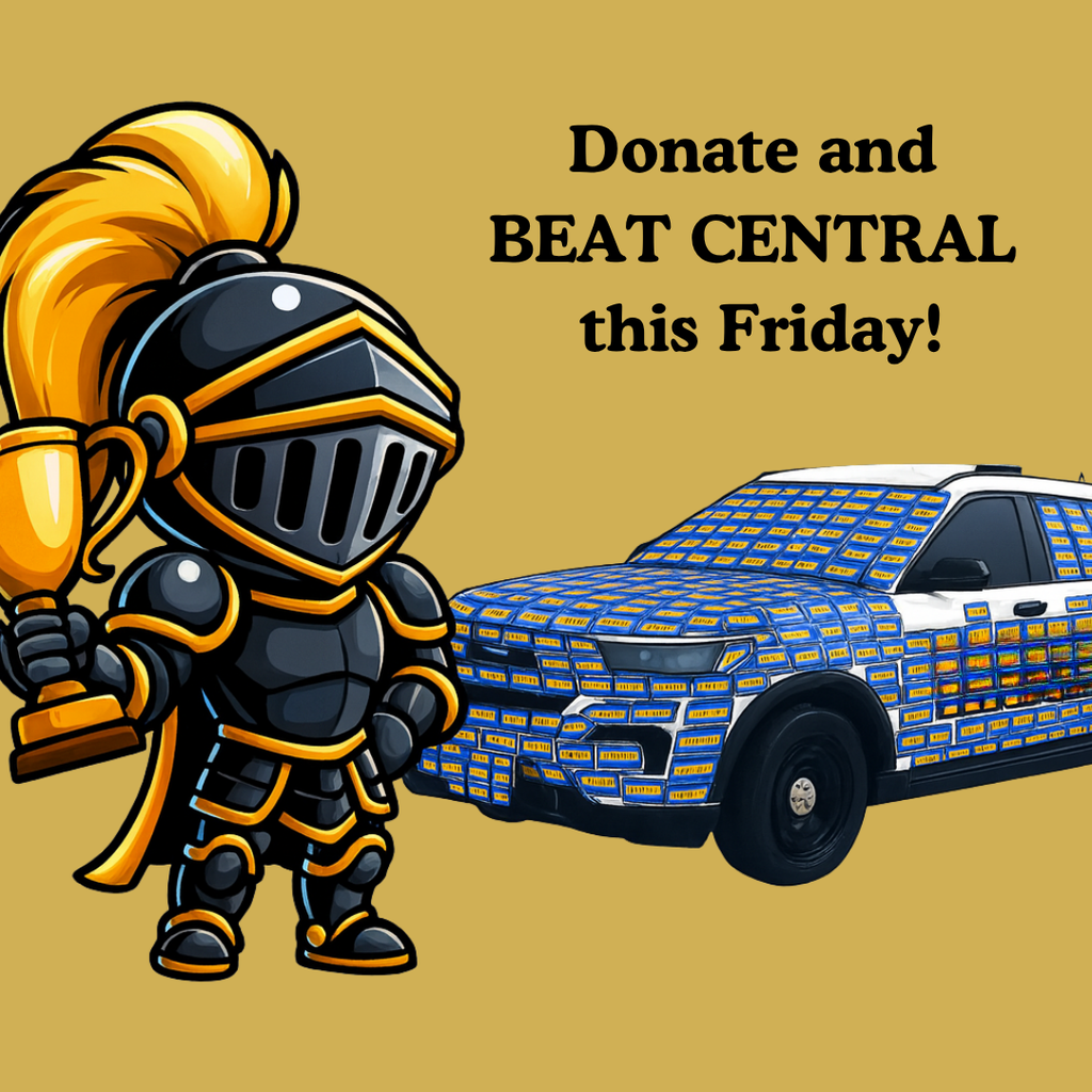 Knight holding a trophy in front of a police cruiser