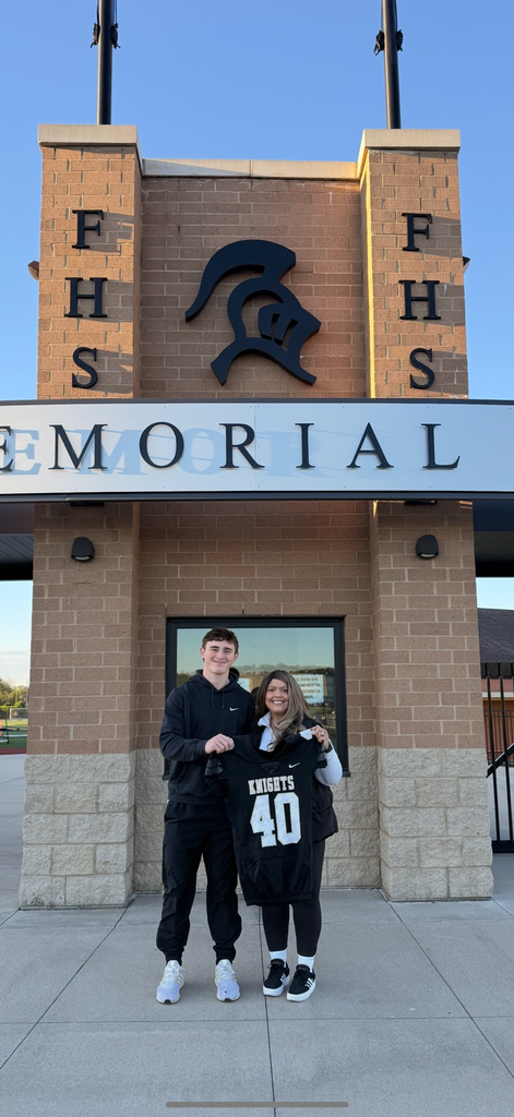 Mrs. Sancegraw with football player Walker Laut