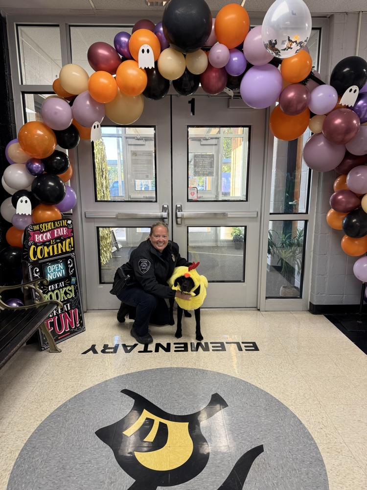 resource officer and dog