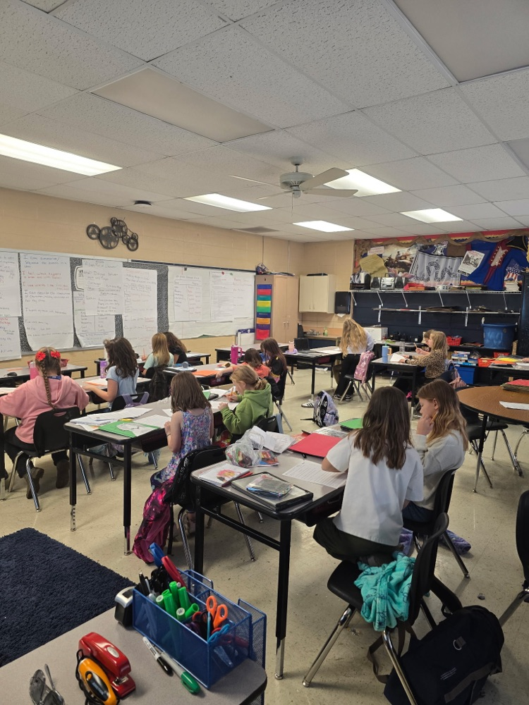 Mr. Lee's class practicing fluency with their partners.