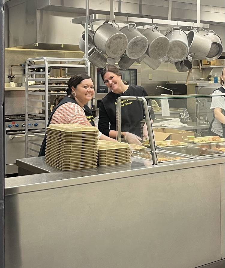 staff serving in the cafeteria 