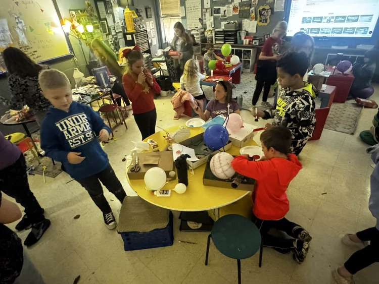 students making balloon projects
