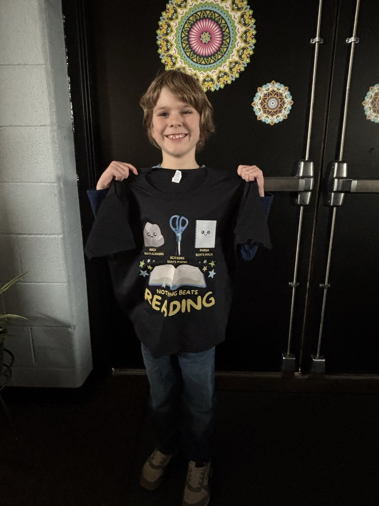 student with reading tshirt