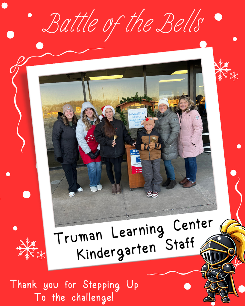 TLC staff members ringing the bell outside WalMart