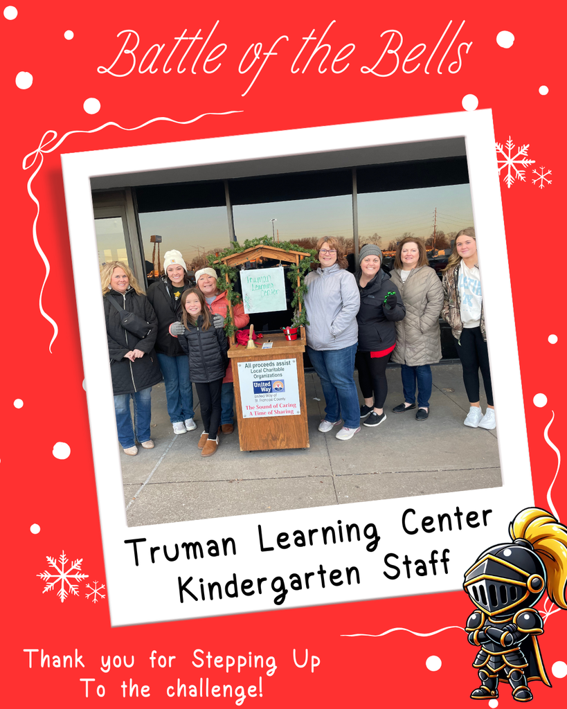 TLC staff members ringing the bell outside WalMart
