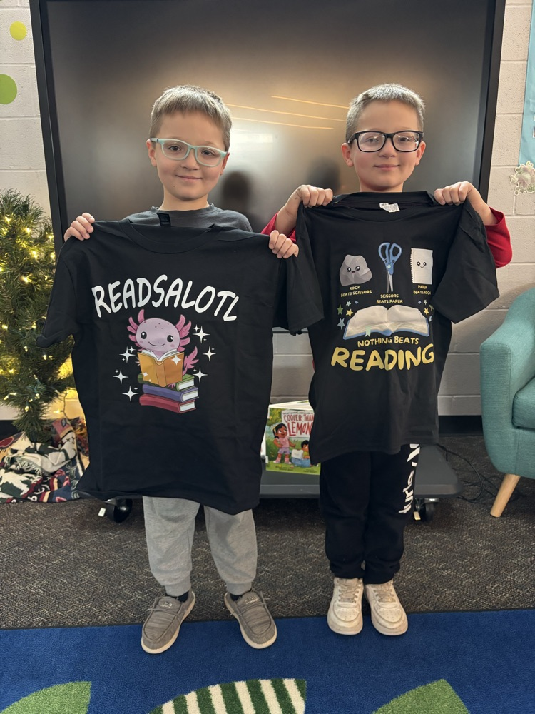 student with reading tshirt