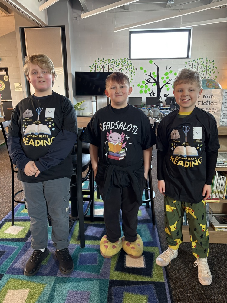 student with reading tshirt