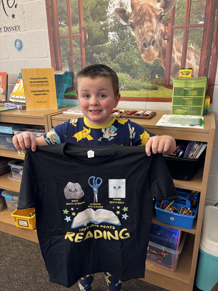 student with reading tshirt