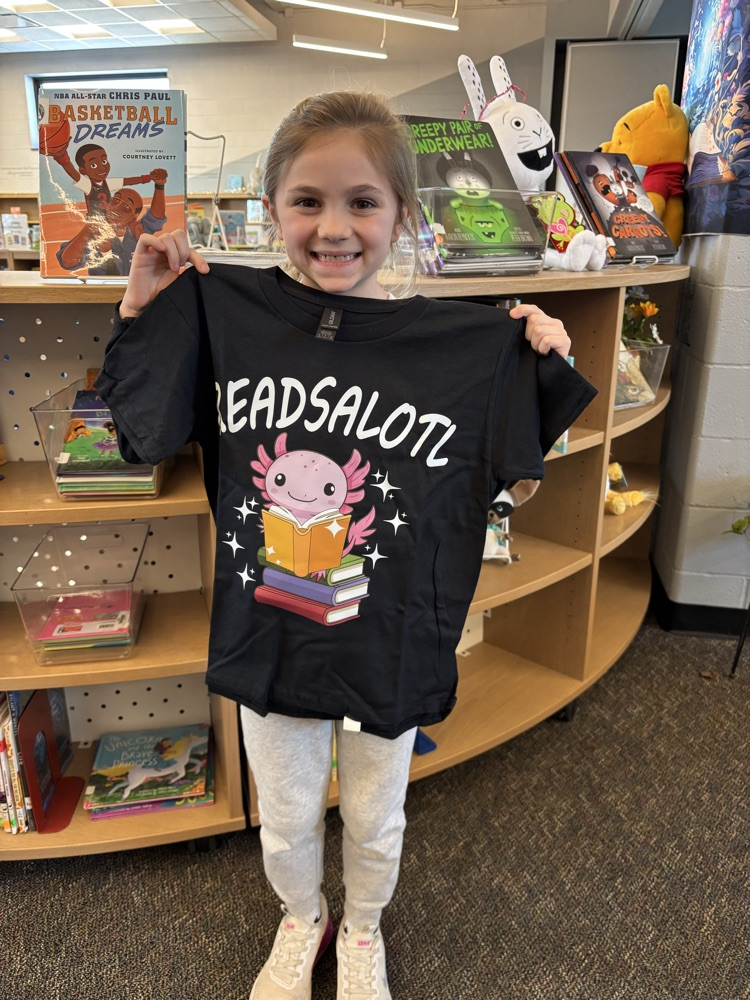 student with reading tshirt
