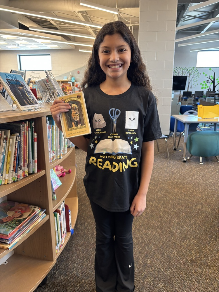 student with reading tshirt